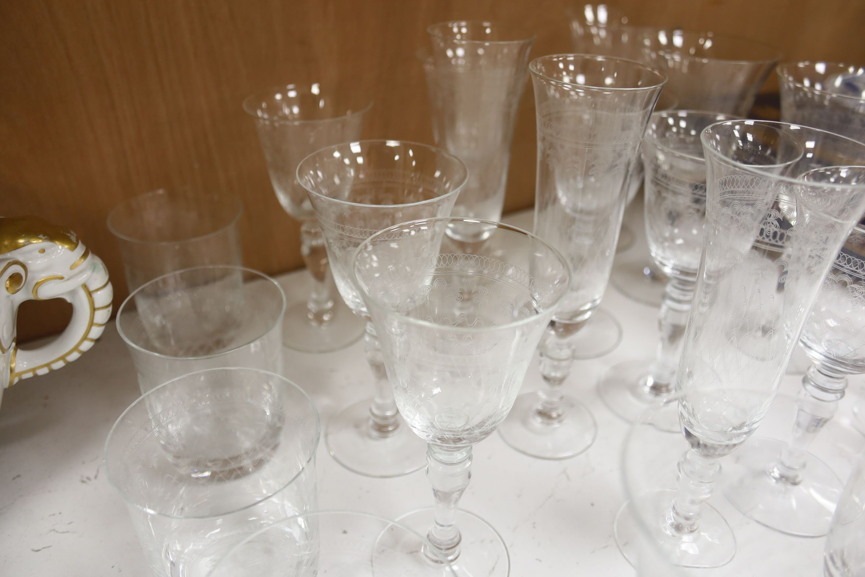 A suite of finely etched glassware, 23 pieces